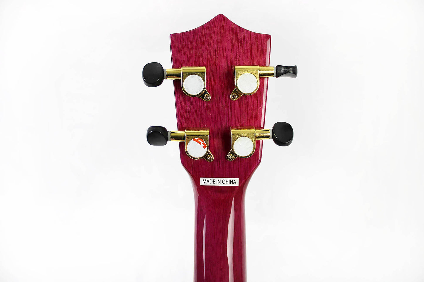 This is the back of the headstock of an Amahi PGUK555PUC Flamed Maple Concert Ukulele- purple.