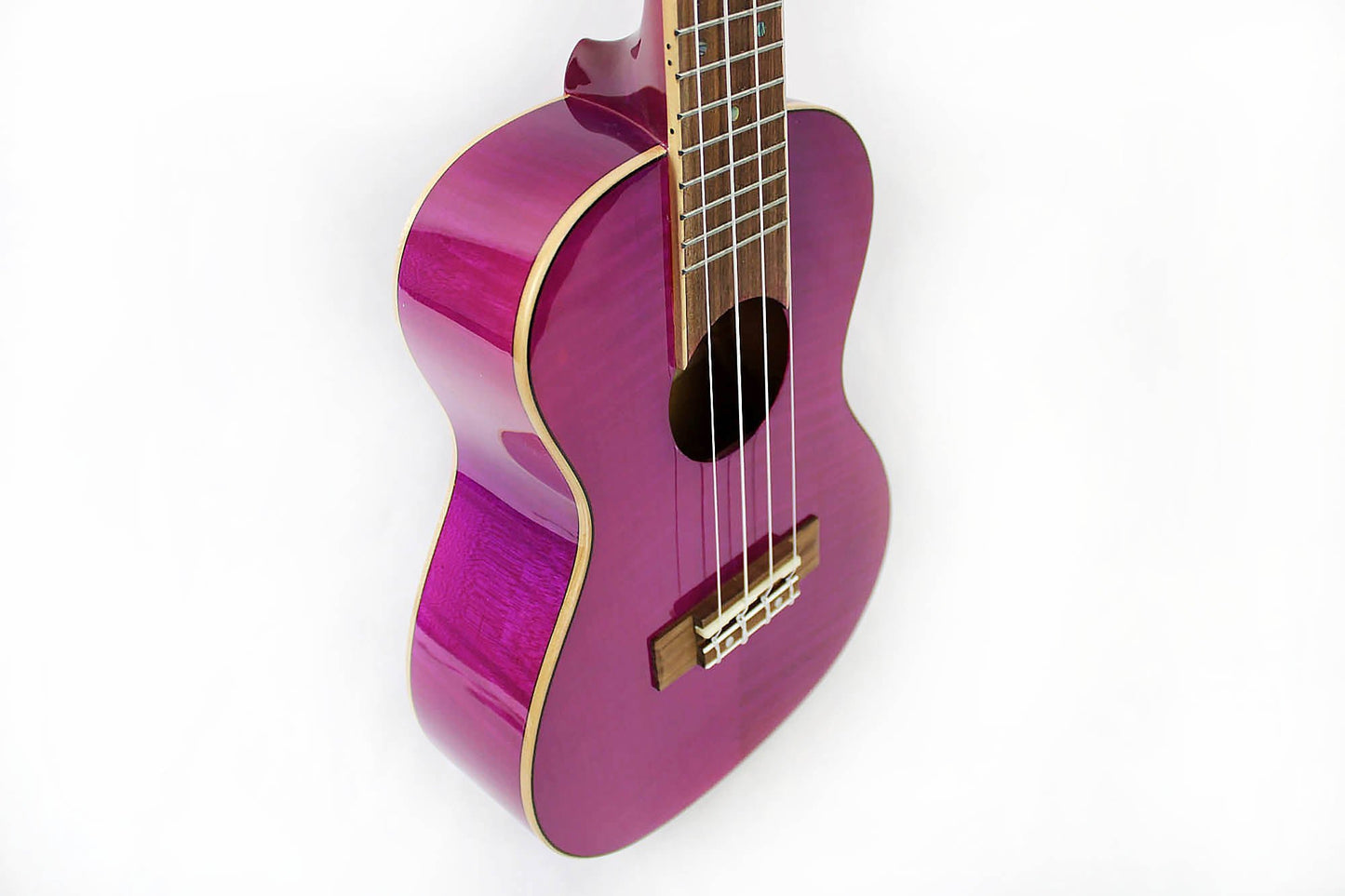 This is the front side view of the body and neck of an Amahi PGUK555PUC Flamed Maple Concert Ukulele- purple.