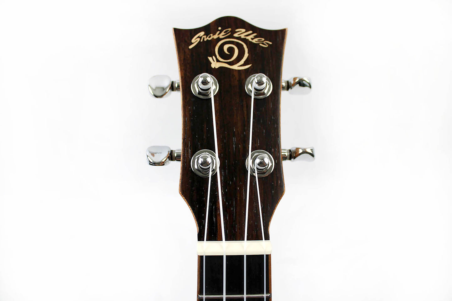 This is the front of the headstock of a Snail SNAILEBUKEQ Ebony Ukulele Concert EQ.