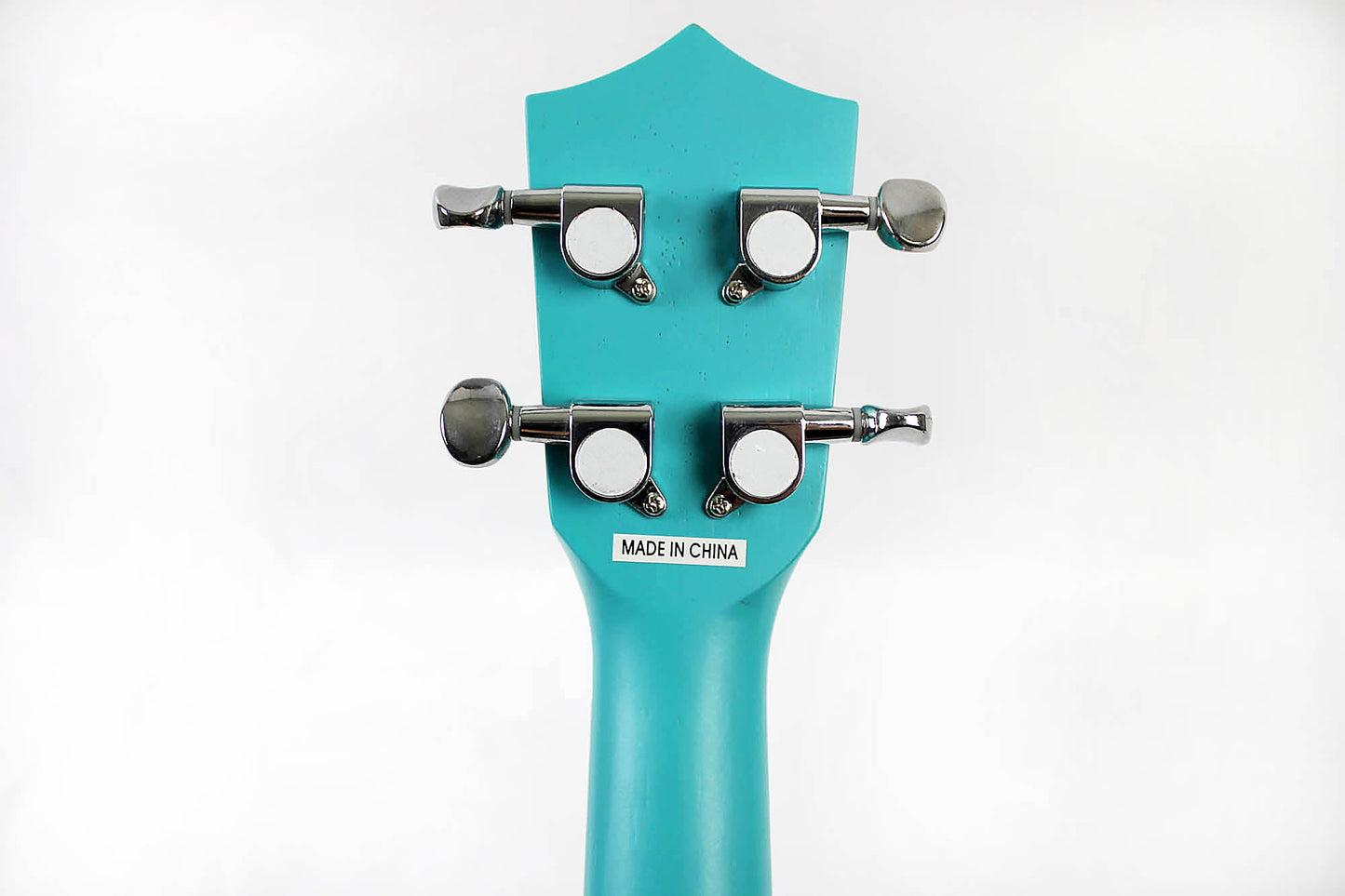 This is the back of the headstock of an Amahi UK205EQLB Concert Ukulele with EQ-Light Blue.